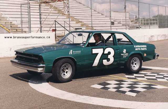 Here with his new 81 Malibu Stock car that I painted for him